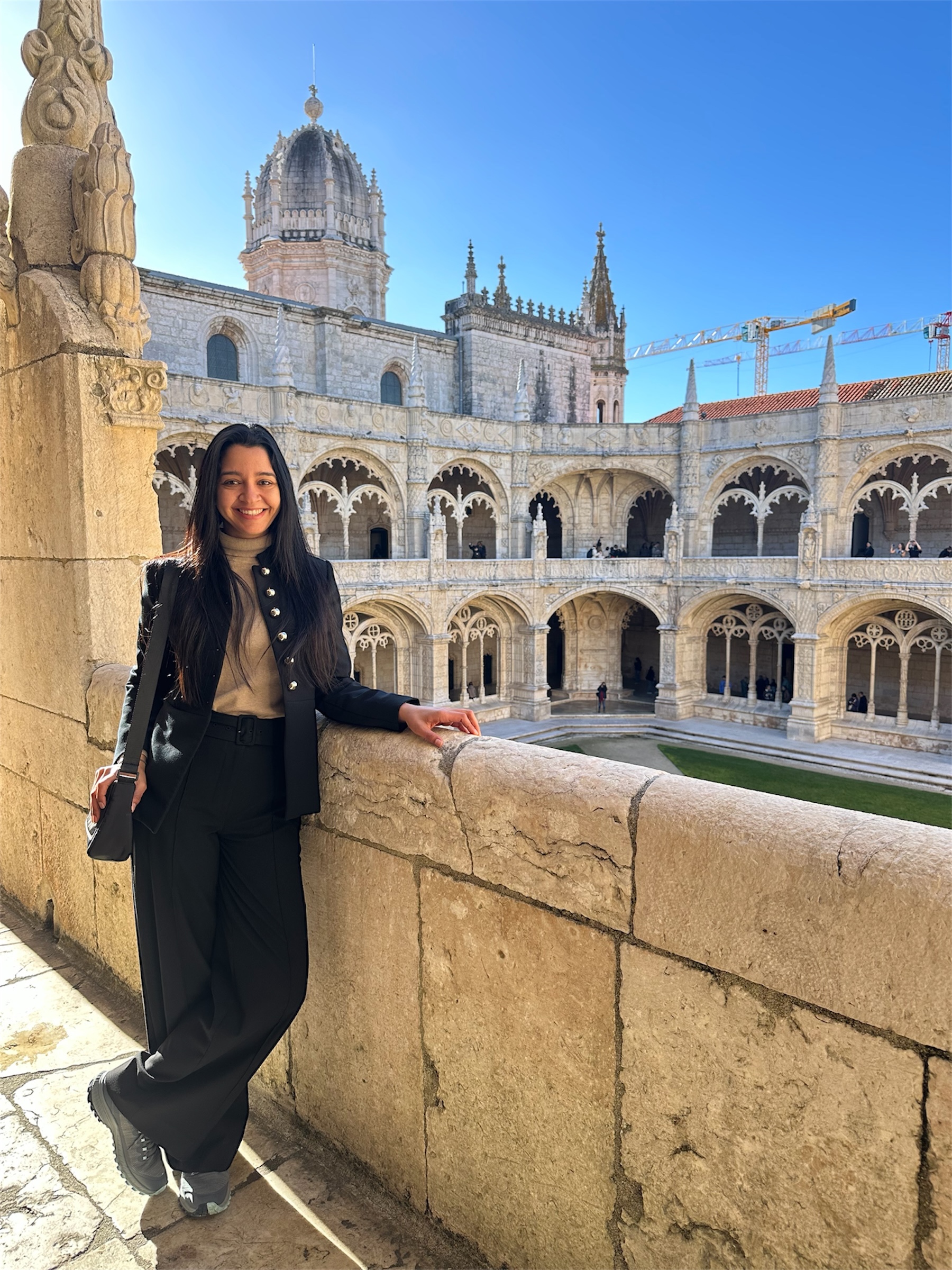 Cecilia Thompson exploring a historic courtyard while traveling